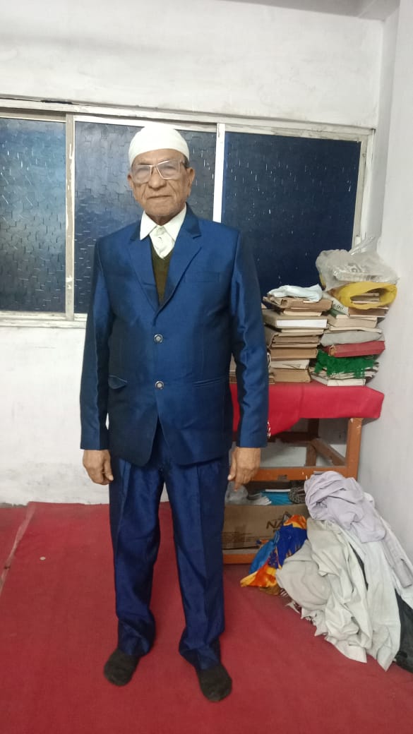 Zamir Ahmed in formal blue suit